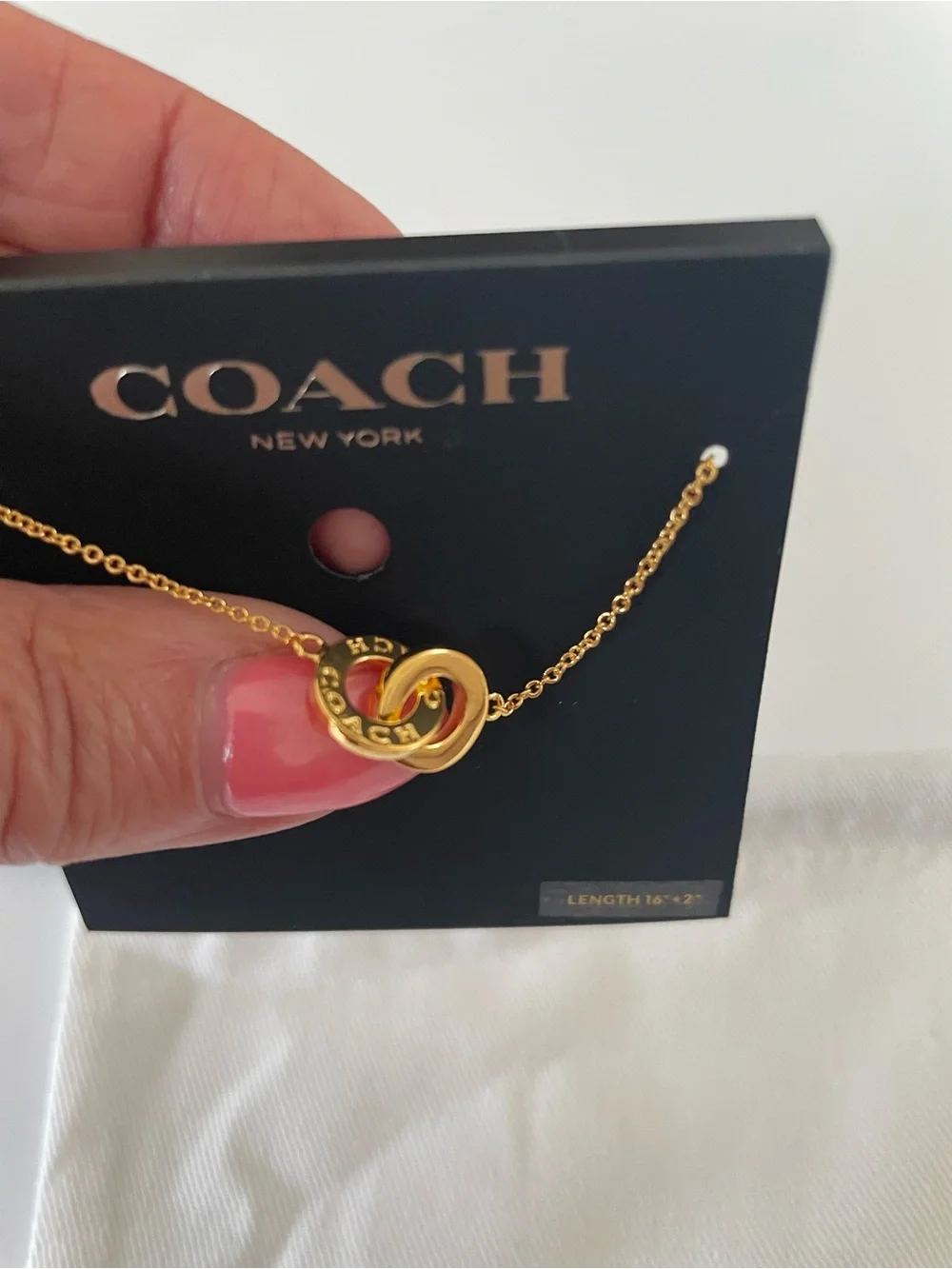 COACH Gold Interlocking Ring Pendant Necklace